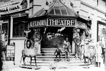 An undated picture showing Tommy Bolstridge, the Manager of the Coventry Alexandra Theatre, outside his cinema with props used to promote the film Jungle Hell.