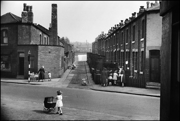 Girl pushing pram Leeds 1950s