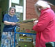 Patsy Shaw handing over the records of Lenton Primary School to Nottinghamshire Archives